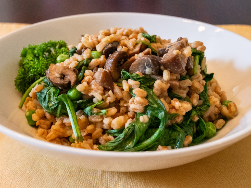 Spinach and Mushroom Farro Risotto with Peas - Easy Smart Vegan